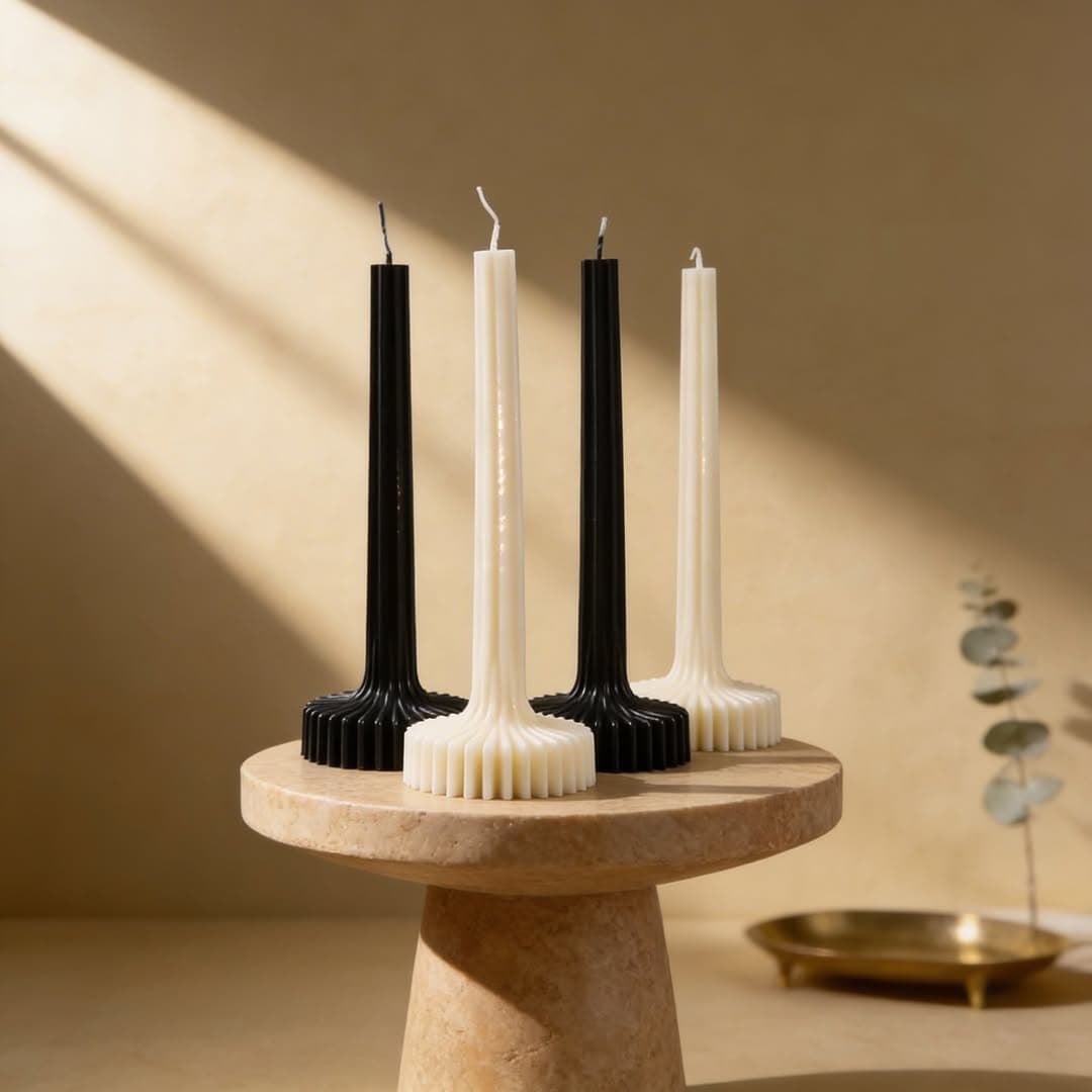 Set of three tall ribbed taper candles in black and ivory