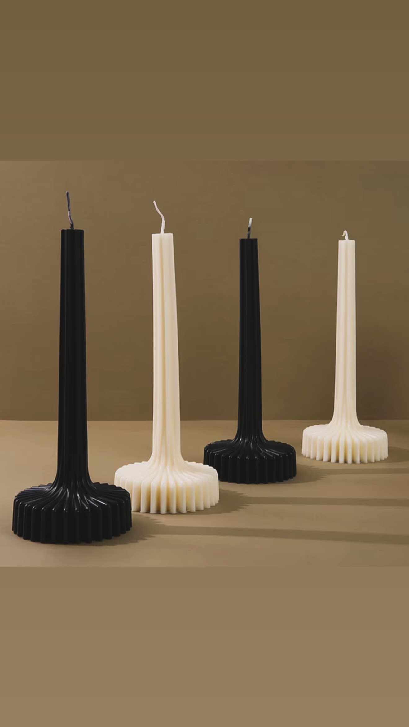 Tall sculptural fluted statement candle